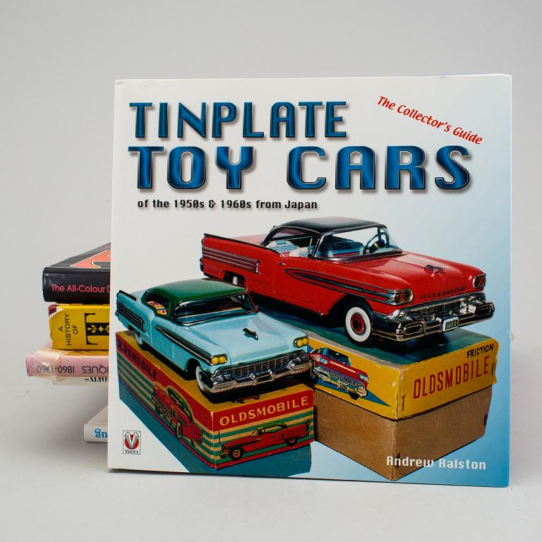 A lot of twelve books regarding tin toys.