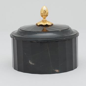 A Swedish Empire black stone butter box.