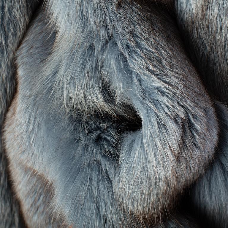 A fox jacket by Karl Lindblom, Stockholm, in size app 38.