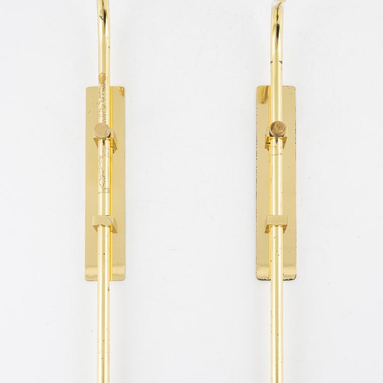 A pair of brass wall lamps, Örsjö, Sweden, later part of the 20th century.