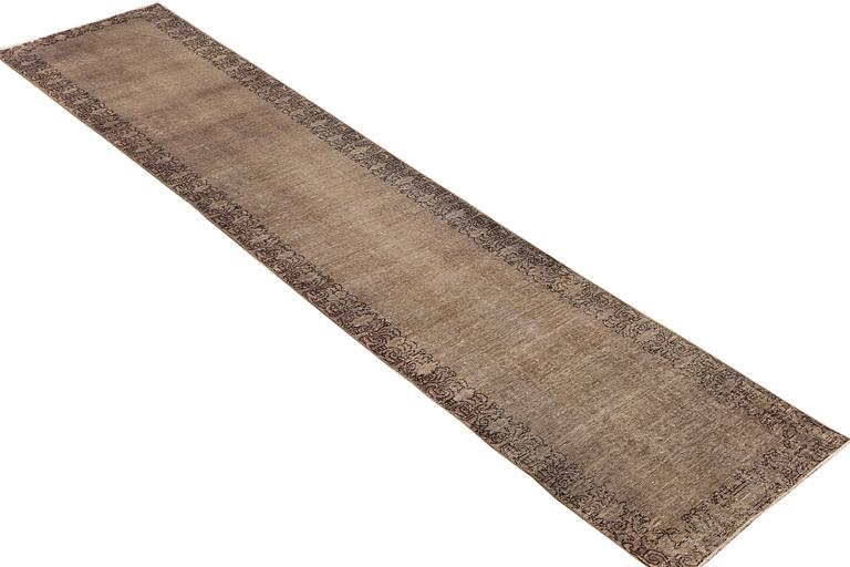 A vintage runner, c. 460 x 80 cm.