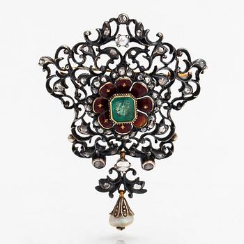 A 12K gold and silver brooch with rose-cut diamonds, cultured pearl and an emerald.