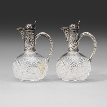 456. A pair of Russian 20th century parcel-gilt and glass flcongs, possibly of Ivan Katorsky, St. Petersburg 1899-1908.