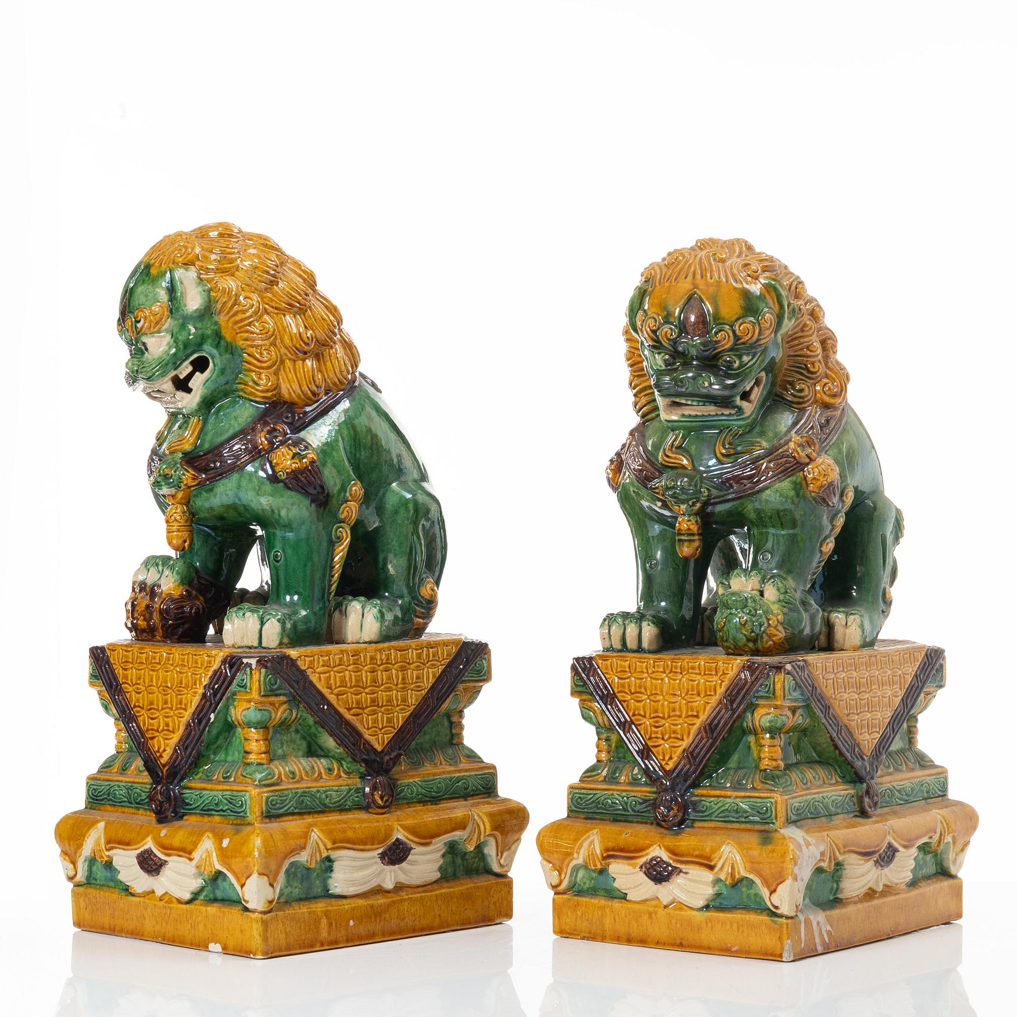 A pair of large figures of buddhist lions, China, second half of the 20th Century.