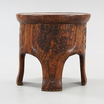 A Gustav Fjaestad Art Nouveau carved pine table by Adolf Swanson, Arvika, Sweden 1908.