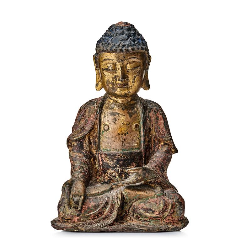 A seated bronze figure of buddha, Ming dynasty (1368-1644).