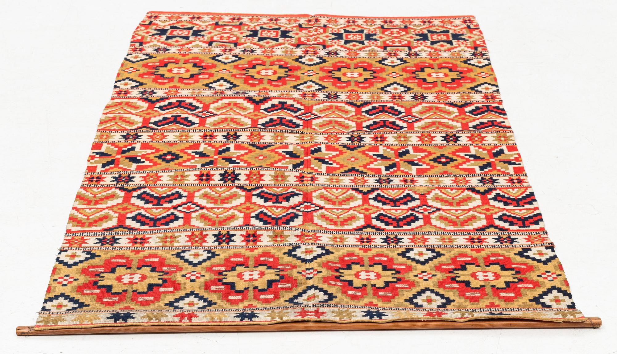 A double-interlocked tapestry bed cover, c. 189 x 112, northeastern Scania.