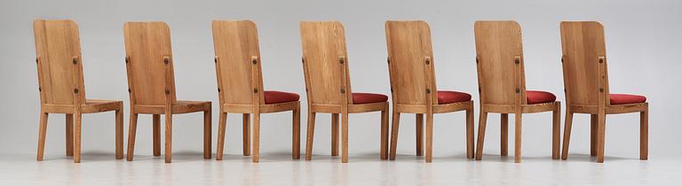 A set of seven Axel Einar Hjorth stained pine 'Lovö' chairs, Nordiska Kompaniet, 1930's.