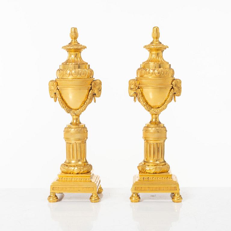 A pair of French Louis XVI style gilt-bronze casolettes, later part 18th century.