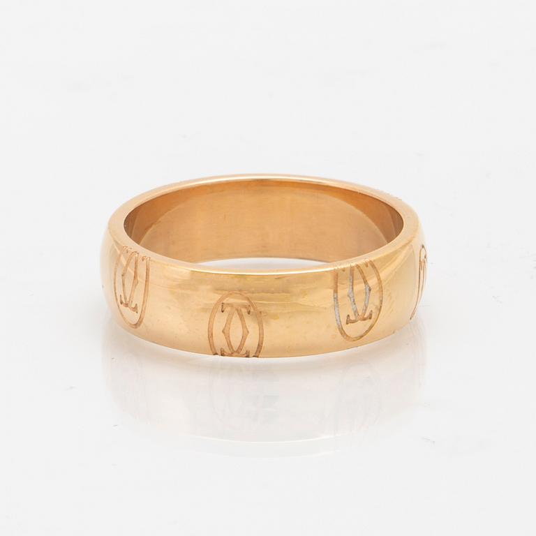 An 18K gold ring "Logo de Cartier" by Cartier.