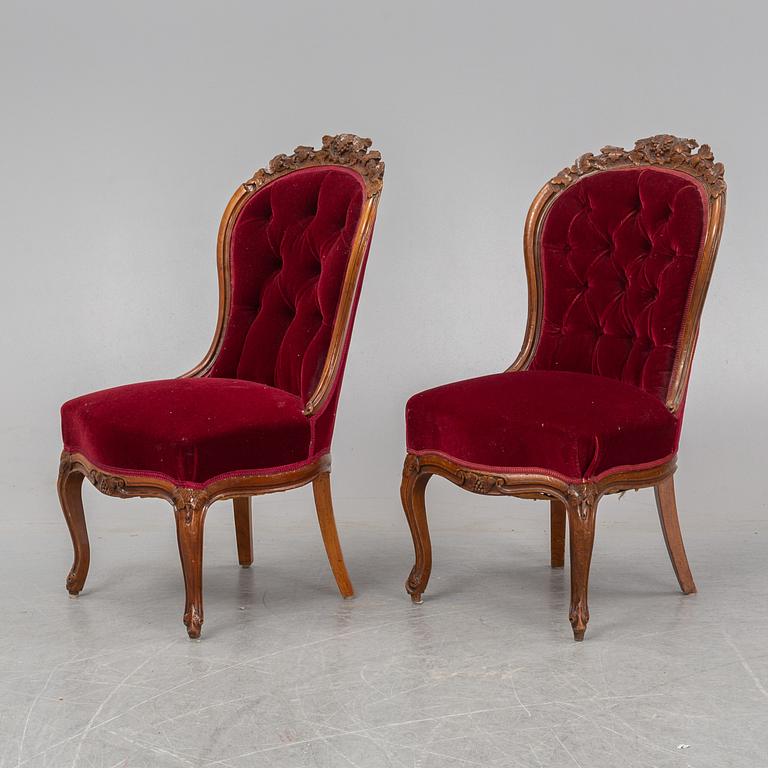 A pair of mahogany Neo-Rococo easy chairs, late 19th Century.