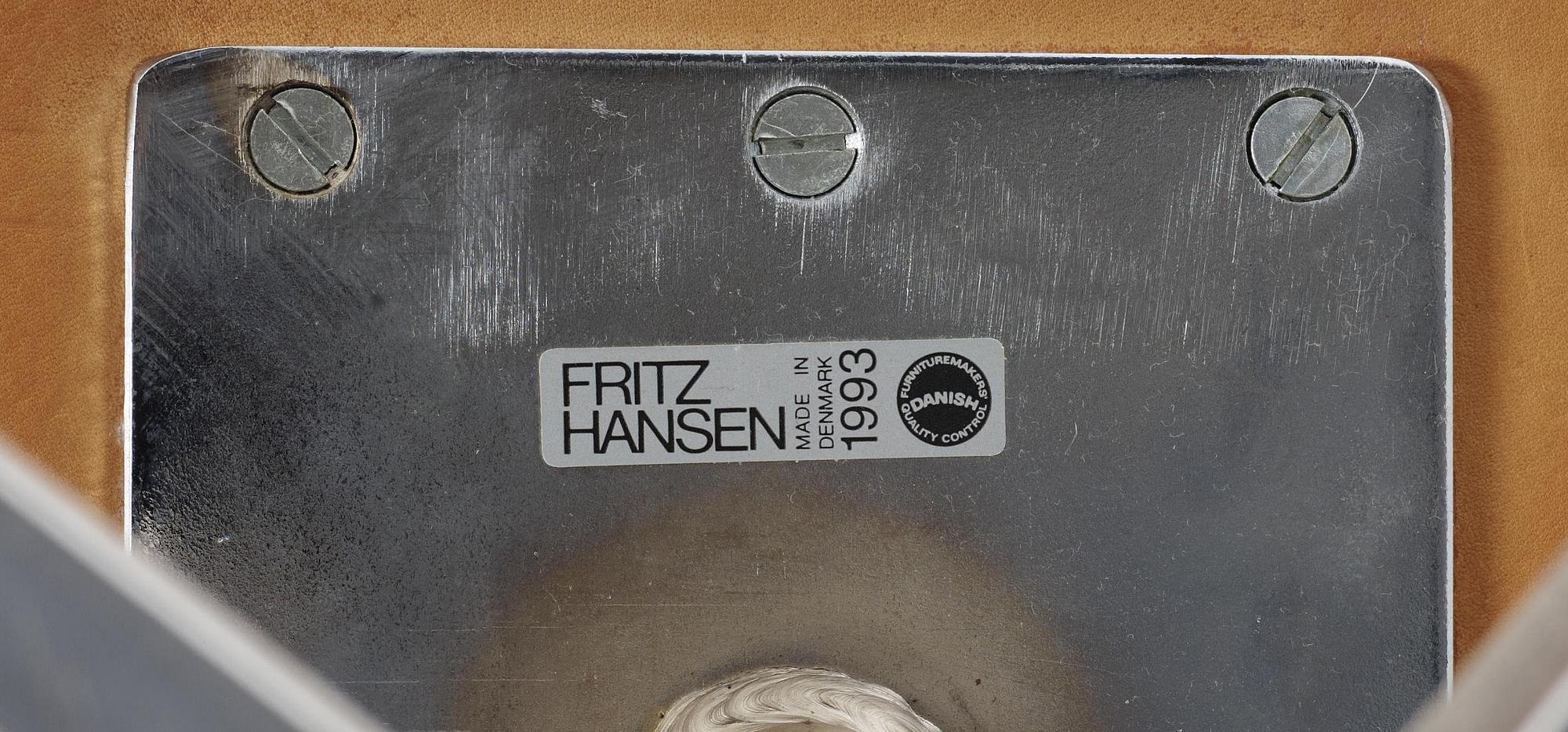An Arne Jacobsen leather 'Swan' chair, Fritz Hansen, Denmark 1993.