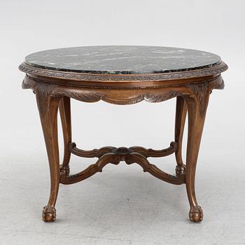 A Chippendale style dining table, first half of the 20th Century.