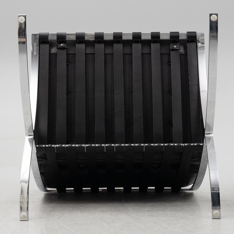 Ludwig Mies van der Rohe, a pair of "Barcelona" lounge chairs, Knoll.