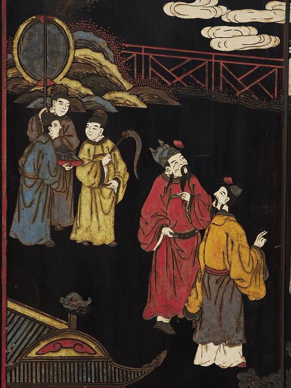 A Chinese four panel lacquer folding screen, first part of the 20th century.