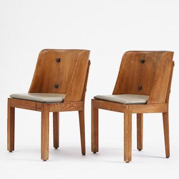 Axel Einar Hjorth, a pair of stained pine "Lovö" armchairs, Nordiska Kompaniet, Sweden, 1930s.