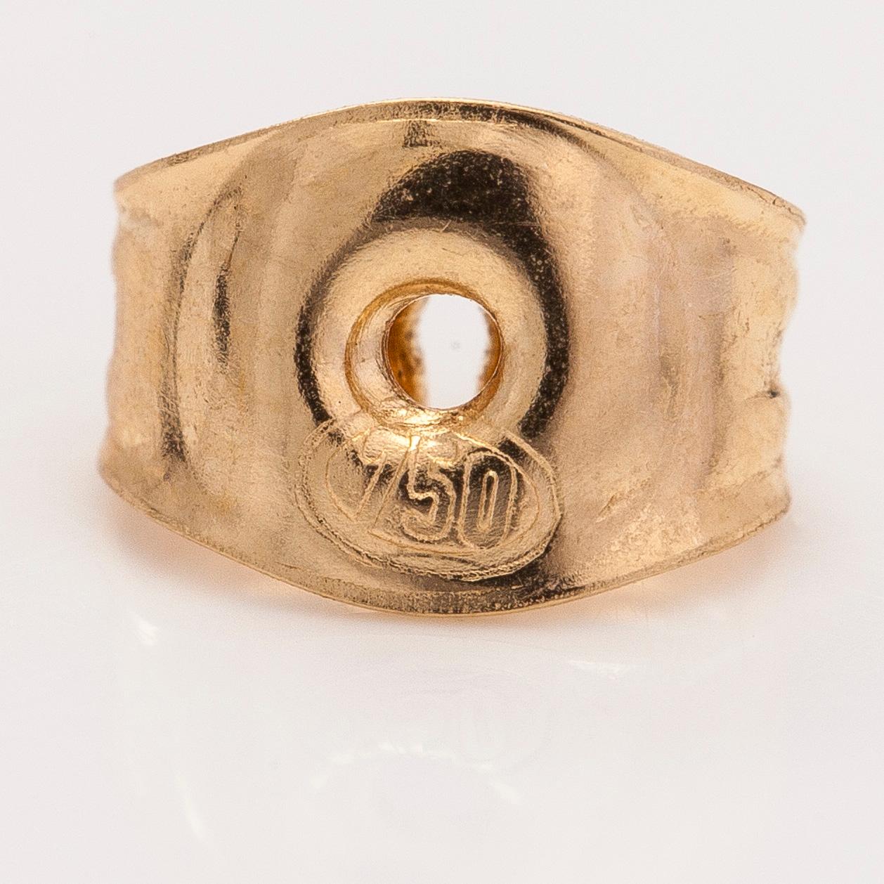 Kirsti Doukas, örhängen, "Pohjantähti", 18K guld och granat. Kalevala Koru, Helsingfors.