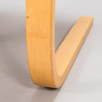 Alvar Aalto, a 21th century '406' armchair for Artek.