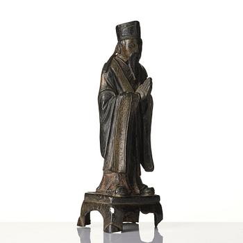 A bronze sculpture of a daoist immortal, Ming dynasty (1368-1644).