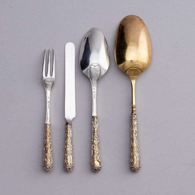 A Swedish parcel-gilt silver and filigree four-piece travel cutlery set, marks of Gustaf Otto Sjöberg, Falun 1813.