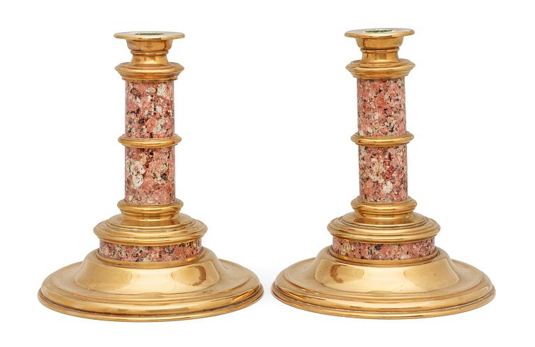 A pair of Swedish late 19th century Garbergsgranitell candlesticks.