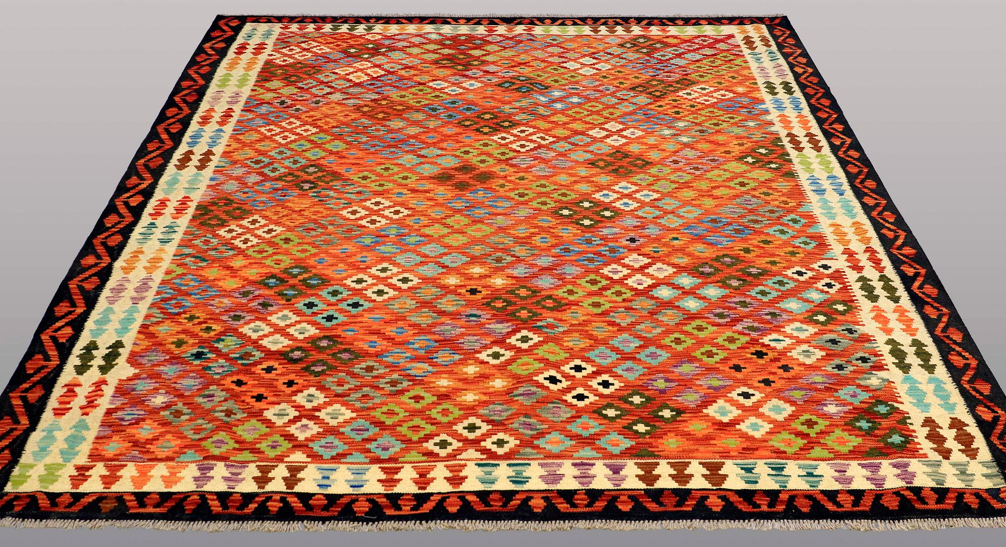 A RUG, kilim, ca 241 x 209 cm.