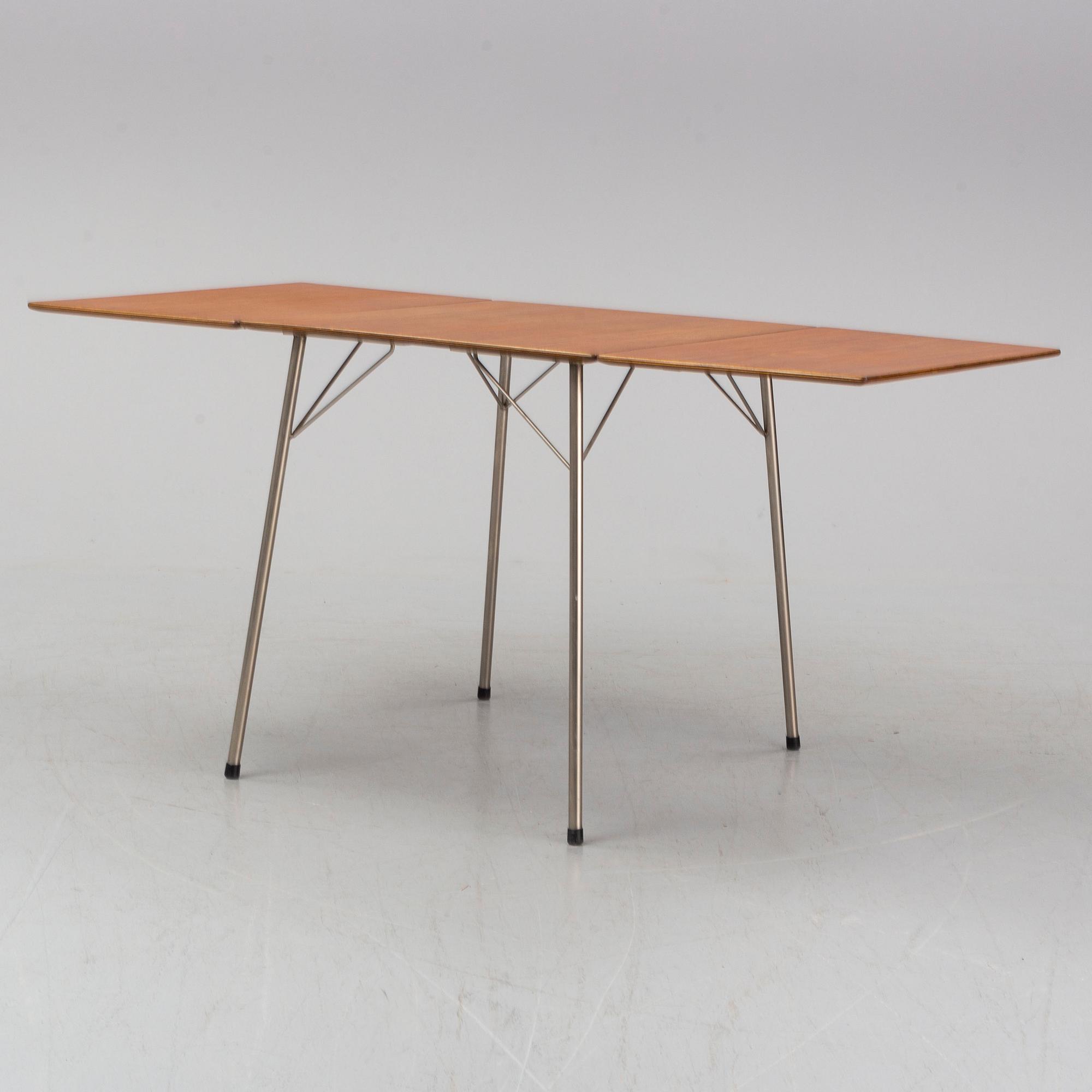 A table by Arne Jacobse, Fritz Hansen, Denmark. Designed 1952-1953.
