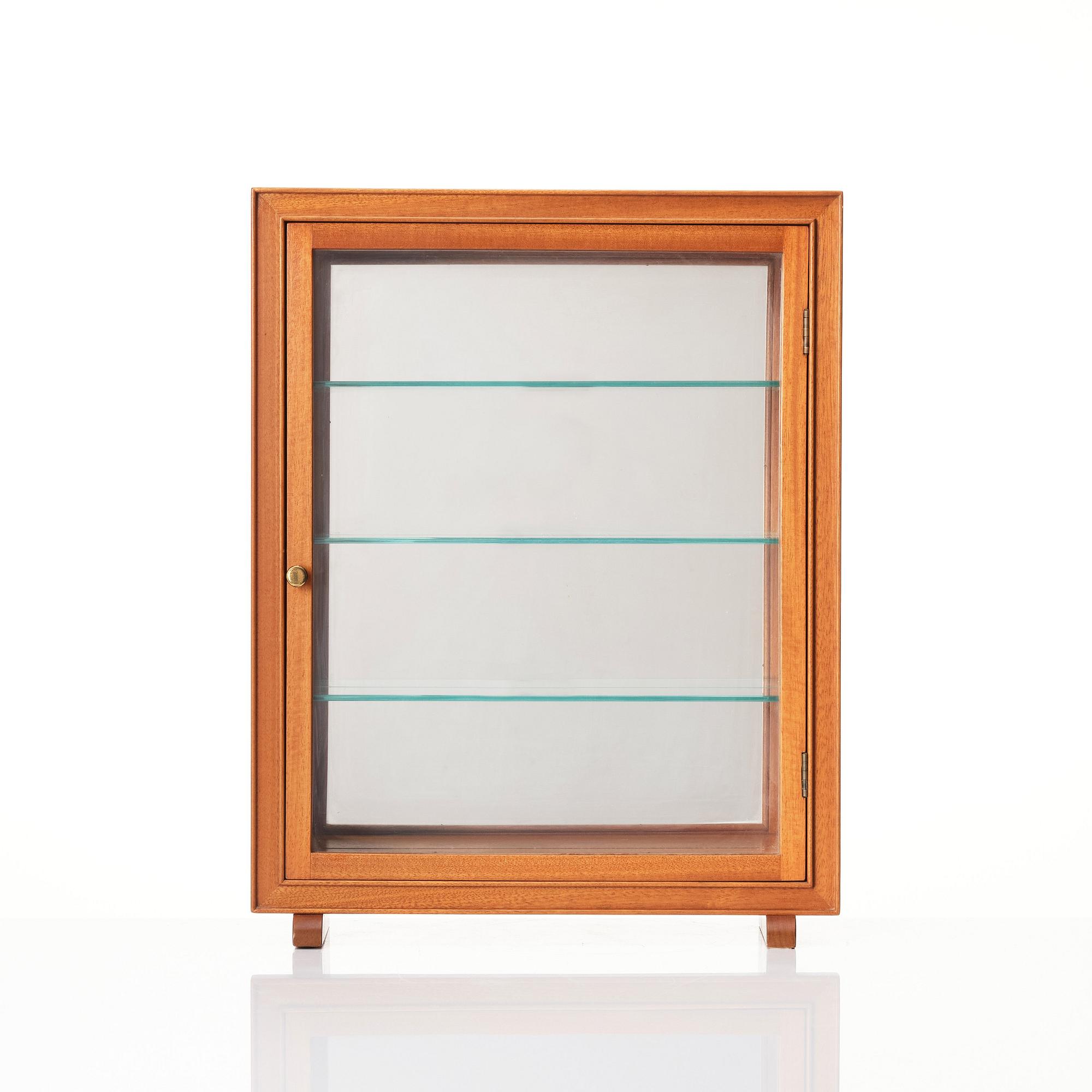Josef Frank, a mahogany table showcase cabinet, model '2069', Svenskt Tenn, before 1985.