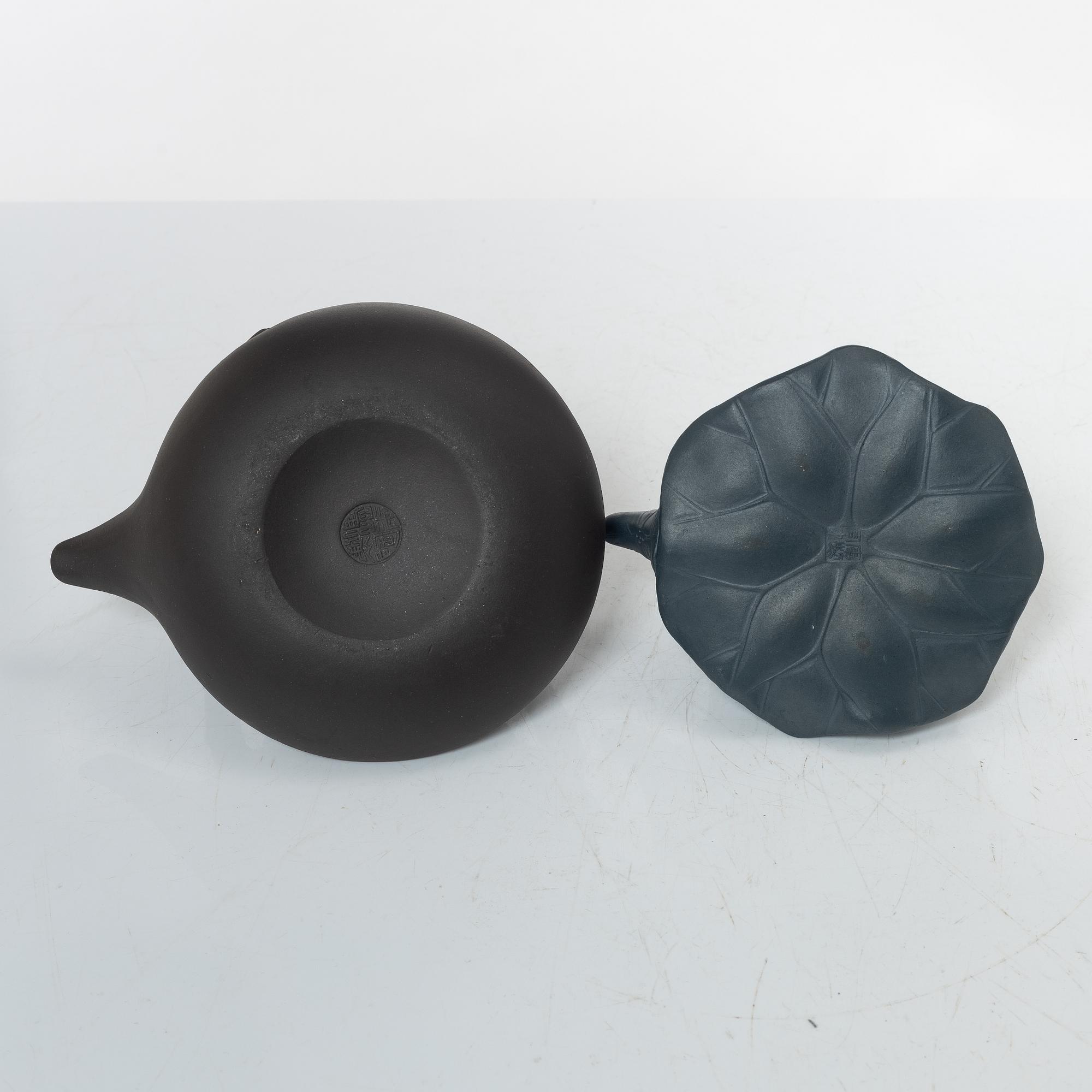 Two Chinese yixing ware teapots, 20th century.