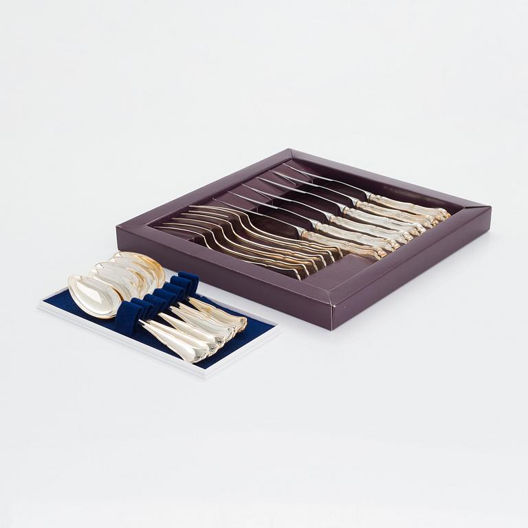 An 18-piece set of 'Chippendale' silver cutlery, Finland 1994.