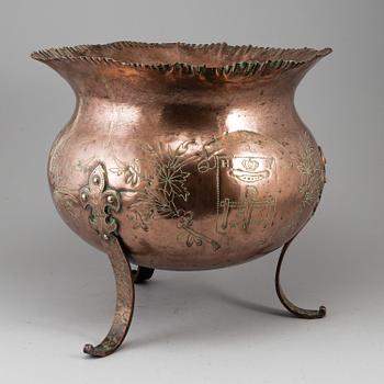 A 19th century copper flower pot.