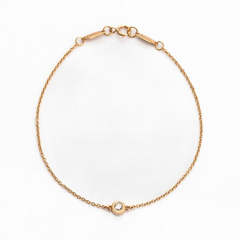 Tiffany & Co, Elsa Peretti, an 18K gold bracelet, 'Diamonds by the Yard', with a diamond approximately 0.08 ct.