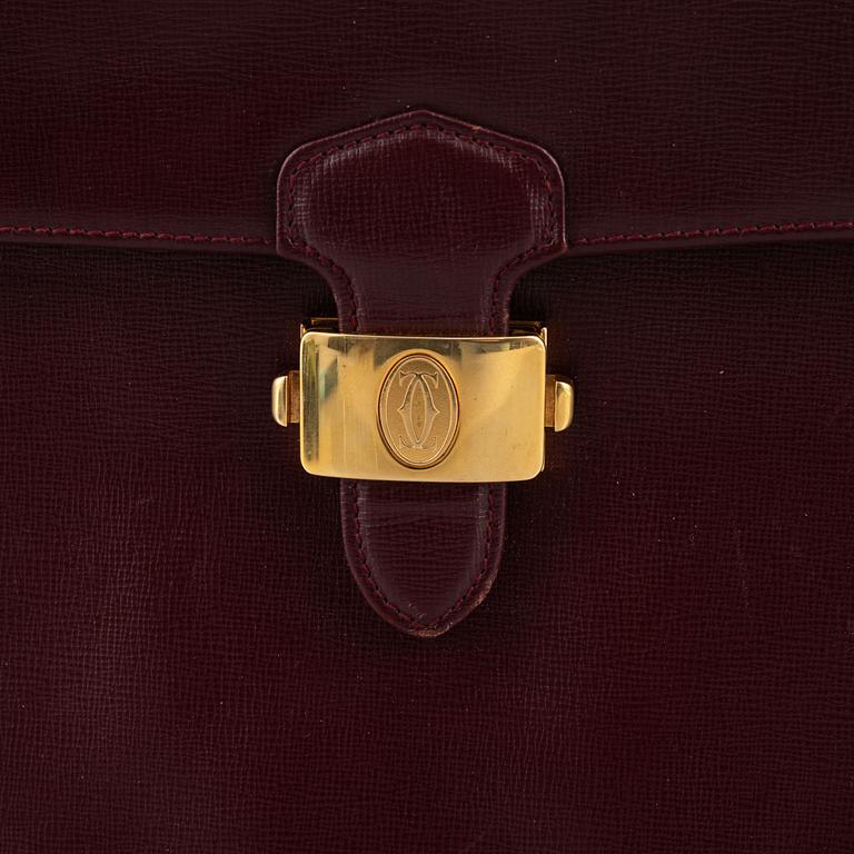 Cartier, a briefcase.