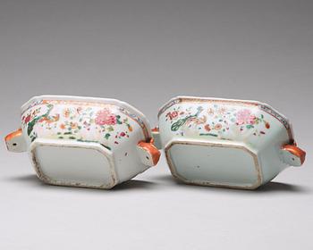 A pair of famille rose 'double peacock' butter tureens with cover and stand, Qing dynasty, Qianlong (1736-95).