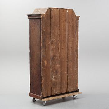 A Swedish painted cupboard dated 1863.