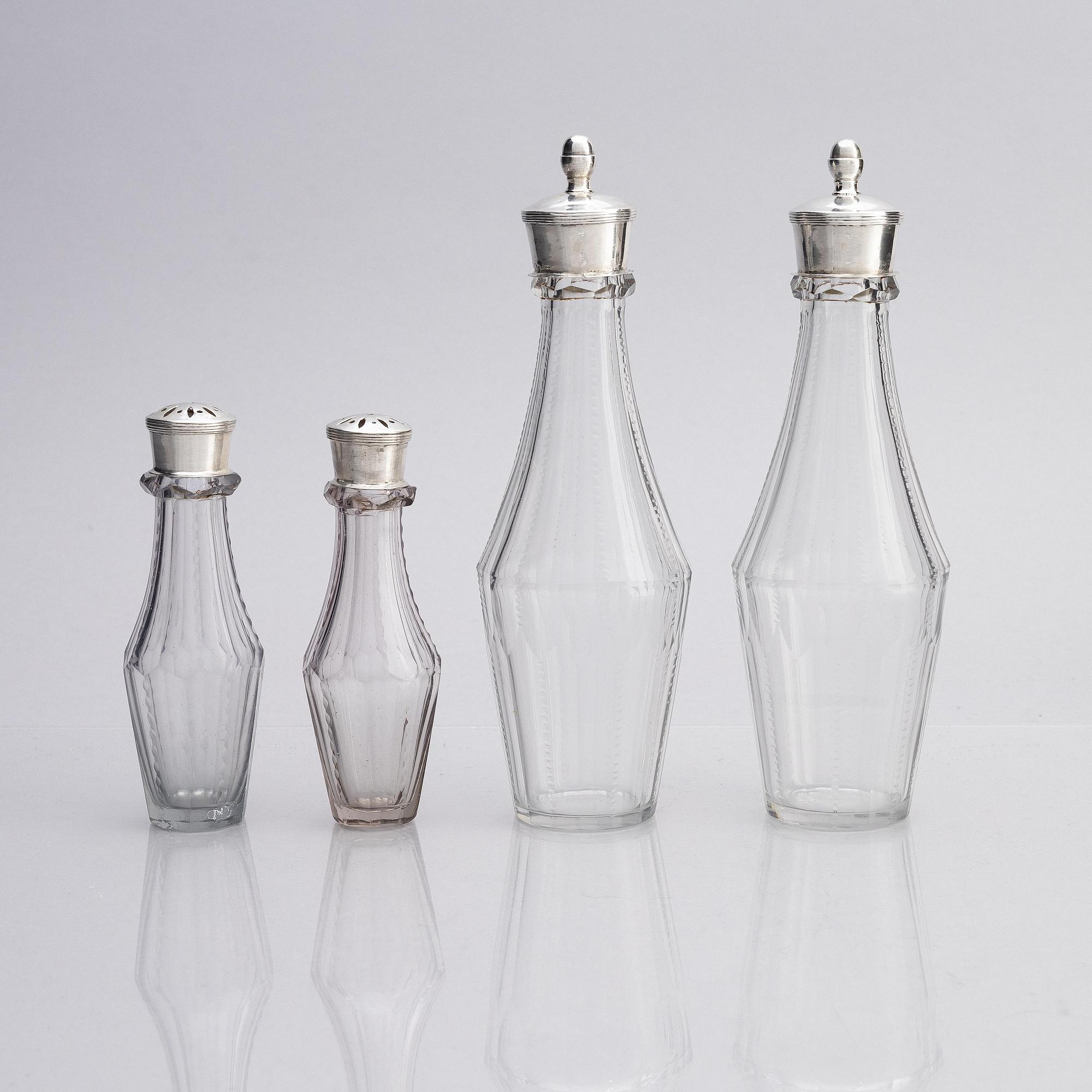 A Swedish 18/19th century silver and glass cruet-set, mark of Pehr Zethelius and Paul Wihlborg, Stockholm 1795 and 1814.
