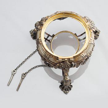 An English silver-gilt teapot with stand and burner, mark of Richard Sibley I, London 1825.