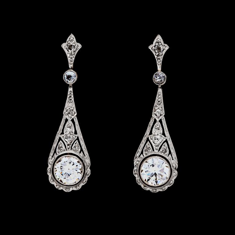 A pair of diamond earrings, each app. 0.70 cts, c. 1930's.