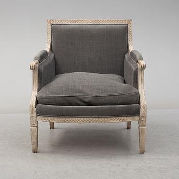 A second half of the 20th century Gustavian style easy chair.