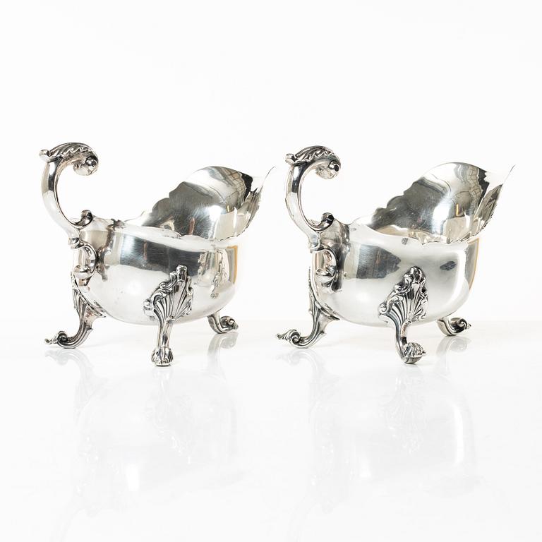 A pair of 18th century silver sauce boats, Richard William, Ireland, spoons, Peter & William Bateman, London 1807.