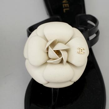 CHANEL, a pair of black plastic sandals. Size 38.