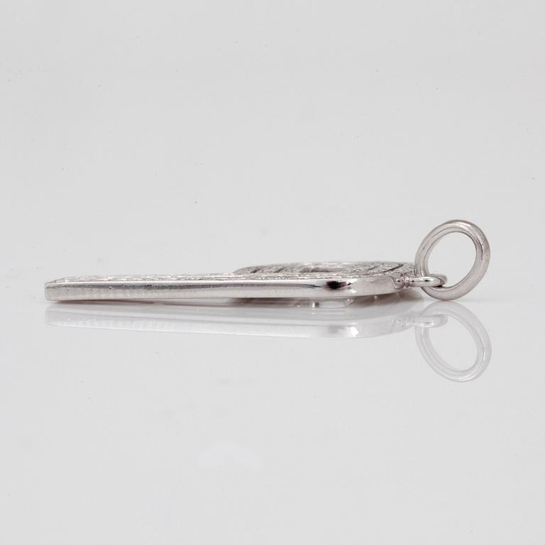 A Garrard and Co brilliant cut diamond pendant. Design by Jade Jagger. "The PI collection".