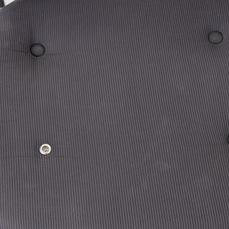 Vico Magistretti, a "Shine" dining table with twelve chairs, De Padova, Italy, around the year 2000.