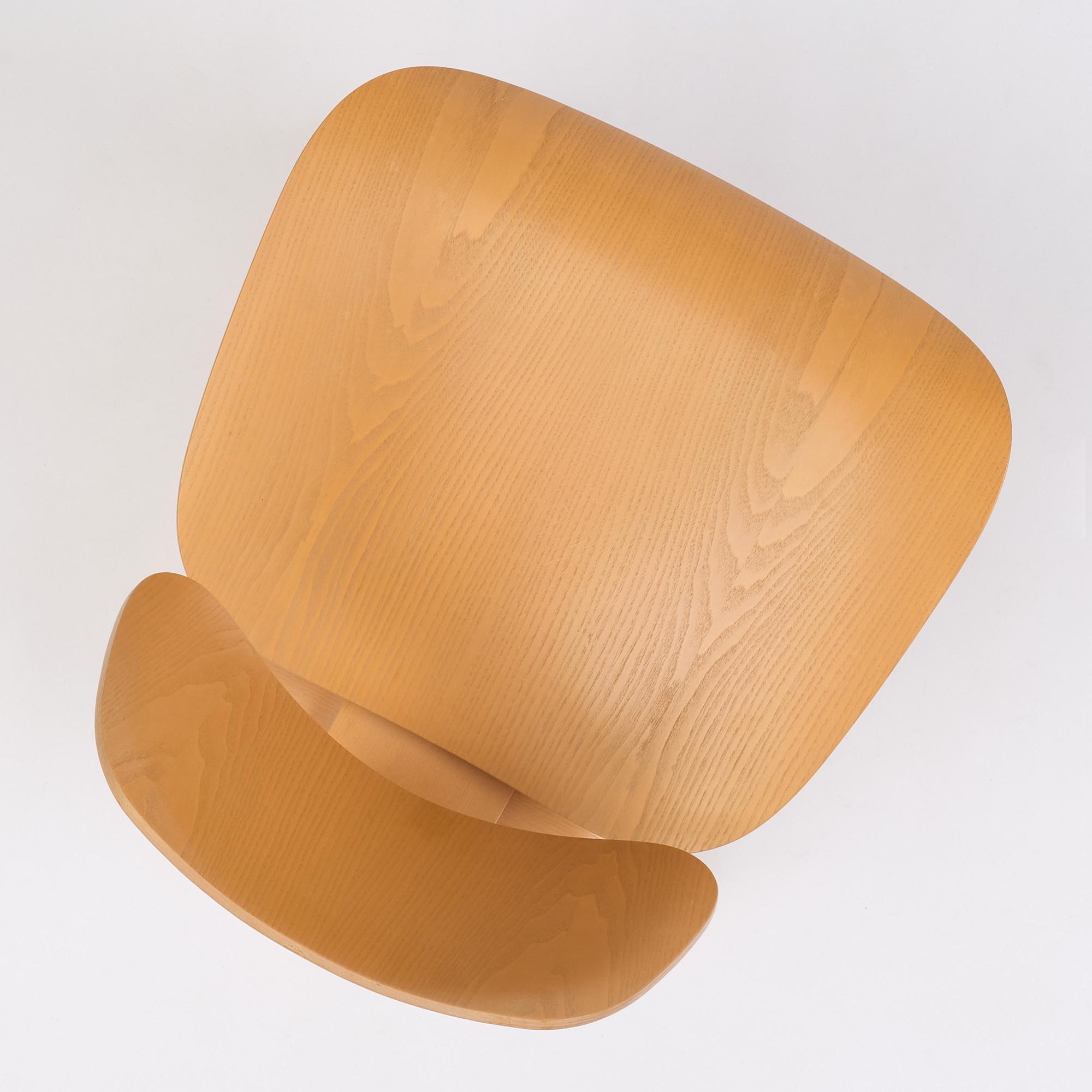 Charles & Ray Eames, a "Plywood Group LCW" easy chair, Vitra, 2015.