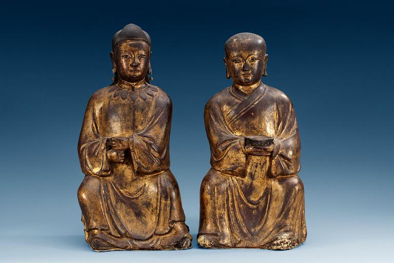 Two gilt lacquer figures of immortals, Ming dynasty, 17th Century.