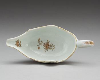 A rouge de fer and gold sauce boat, Qing dynasty, Qianlong (1736-95).