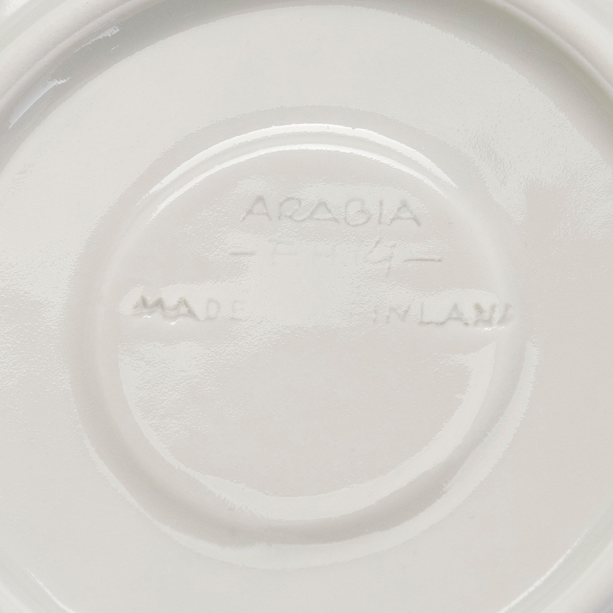 Friedl Holzer-Kjellberg, a 14-piece rice grain porcelain espresso service, signed F.H.Kj Arabia Finland.