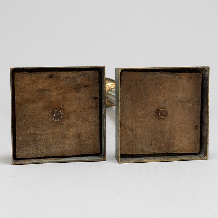 A pair of bronze gustavian candlesticks, late 18th century.