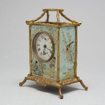 A mantel clock, circa 1900.