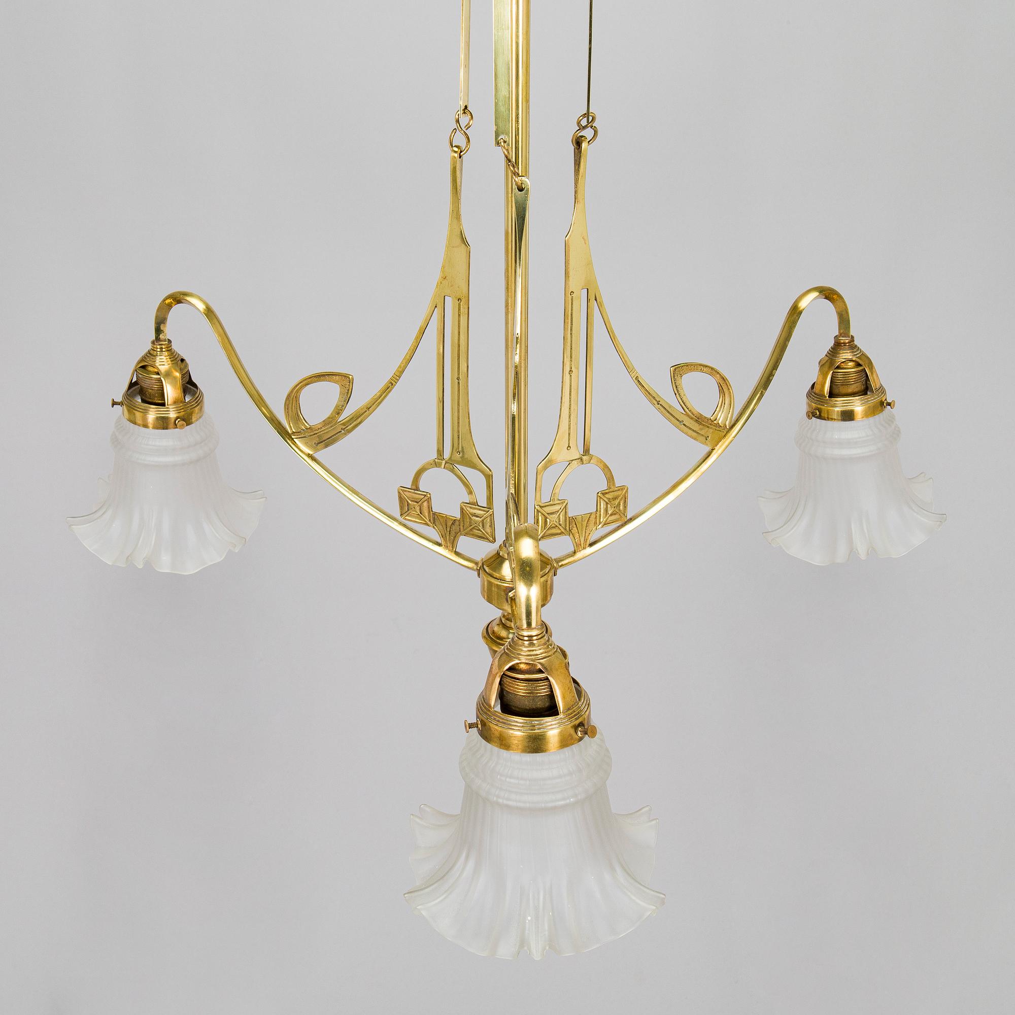 Kattovalaisin, 1900-luvun alku.